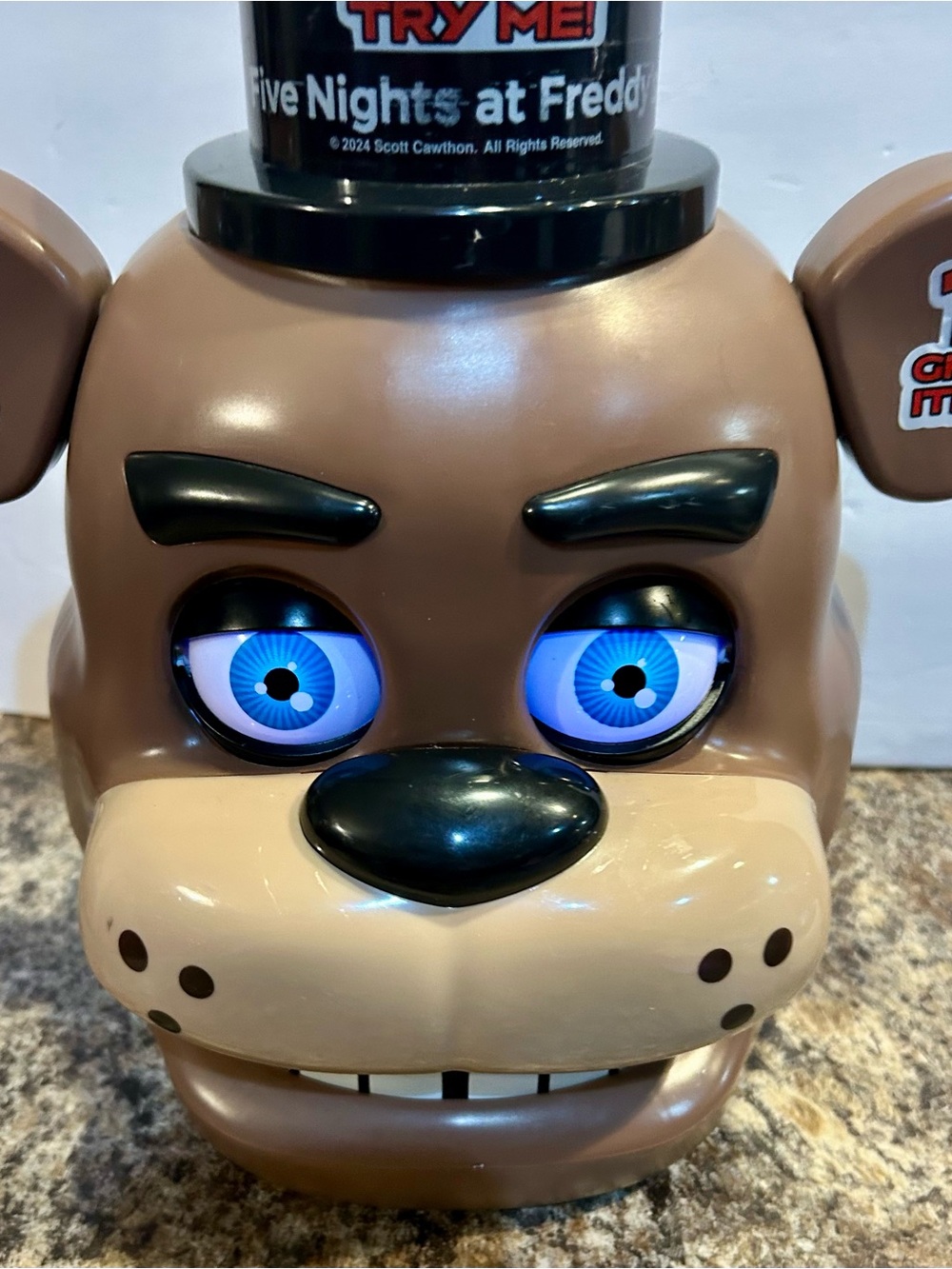 Freddy Fazbear Interactive Head Toy - Brown with Blue Eyes